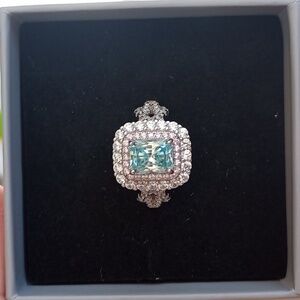 Green moissanite sterling silver engagement ring